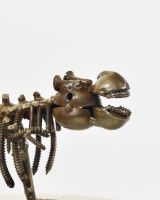 "Snap" Upcycled Metal T-Rex Ornament close up of head