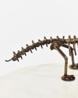 "Snap" Upcycled Metal T-Rex Ornament close up of tail
