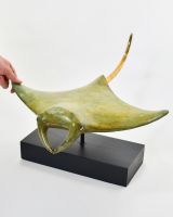 "Sovereign Glider" Ray Large Cast Brass Ornament - Light Verdigris with hand in shot for scale