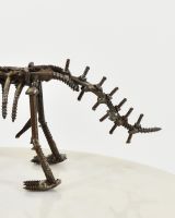 "Spike" Upcycled Metal Triceratops Ornament close up of tail