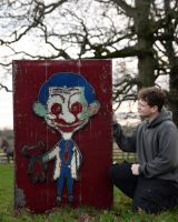"The Silent Comedian" Oil Drum Scrap Metal Wall Art red background