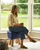 Person Sat on "The Yale" Mango Wood & Blue Leather Stool for Scale Person Sat on "The Yale" Mango Wood & Blue Leather Stool for Scale