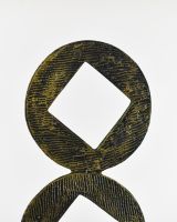 "Triple Aspect" Cast Aluminium Home Ornament - Black and Gold close up of top