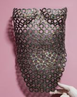 "Vesta" Female Torso Reclaimed Metal Wall Sculpture - 63cm mounted on wall close up with hand in shot for scale