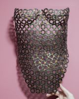 "Vesta" Female Torso Reclaimed Metal Wall Sculpture - 63cm mounted on wall wiht hand in shot for scale