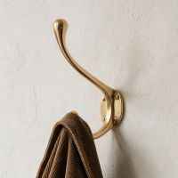 A Close up of a "Hackenly Park" Brass Hook Fitted on a Wall - Digital Illustration A Close up of a "Hackenly Park" Brass Hook Fitted on a Wall - Digital Illustration
