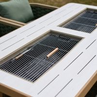 A Close up of the Integrated BBQ"s in the Table of "The Imelda" Six Seater Garden Lounge And BBQ Furniture Set A Close up of the Integrated BBQ"s in the Table of "The Imelda" Six Seater Garden Lounge And BBQ Furniture Set