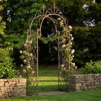A Gothic Wrought Iron Rose and Climbing Plant Archway in a Decorative Low Walled Garden - Digital Illustration 