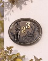 A Number 23 "Wembley Stadium" Footballer House Number Sign in a Bronze Finish Mounted on a Cream Coloured Cottage Wall - Digital Illustration