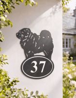 A Number 37 nChow Chow Dog Iron House Number Sign Mounted on a White Coloured Countryside Building - Digital Illustration
