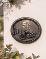 A Number 56 "Chopper" Classic Motorbike House Sign Mounted on a Sunny Cottage Wall - Digital Illustration A Number 56 "Chopper" Classic Motorbike House Sign Mounted on a Sunny Cottage Wall - Digital Illustration