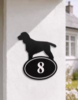 A Number 8 Cocker Spaniel Iron House Number Sign Mounted on a White Cottage Garden Wall - Digital Illustration A Number 8 Cocker Spaniel Iron House Number Sign Mounted on a White Cottage Garden Wall - Digital Illustration