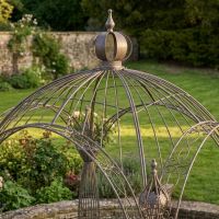 A Victorian Domed Metal Garden Gazebo with Decorative Pillar Columns Close up View of the Top Central Finial - Digital Illustration A Victorian Domed Metal Garden Gazebo with Decorative Pillar Columns Close up View of the Top Central Finial - Digital Illustration