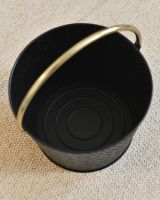 Above The Black & Gold Dimpled Steel Log Basket 