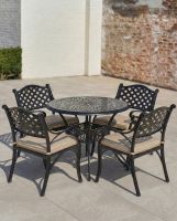 Aged Black "Farleigh" Four Seater Furniture Set in Situ on an Outdoor Garden Patio with cushions