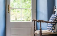 Aged Brass Slimline Espag Lever Door Handle in Situ