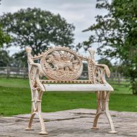 Aged Cream Cast Iron Dog One Seat Park Bench in situ