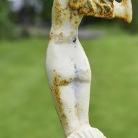Close-up of the Rustic Cream Finish on the Lady Standing on Clam Sculpture