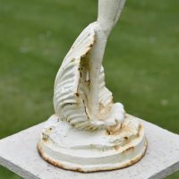 Close-up of the Base of the Lady Standing on Clam Sculpture
