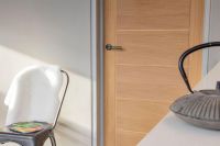 Aged Pewter Hammered Unsprung Lever Door Handle on Beehive Rose on Door Aged Pewter Hammered Unsprung Lever Door Handle on Beehive Rose on Door