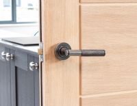 Aged Pewter Textured Unsprung Lever Door Handle on Rose on Door Aged Pewter Textured Unsprung Lever Door Handle on Rose on Door