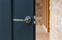 Aged Pewter Unsprung Lever Door Handle on Rose in Situ