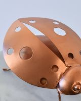 Close up of body detail on recycled metal art sculpture