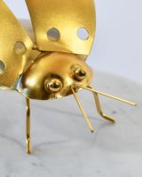 Close up of face detail on scrap metal art sculpture