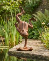 ai illustration Rustic Cast Iron "Handstanding" Frog Sculpture by water