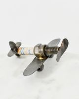 Angled view of recycled metal art sculpture