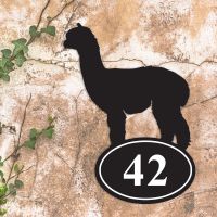 Alpaca Iron House Number Sign in Situ a Rustic Wall
