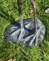 Base and feet of Aluminium Crane Sculpture