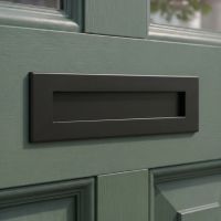 An Aged Bronze Traditional Sleeved Door Letterbox Set on a Dark Green House Front Door - Digital Illustration 