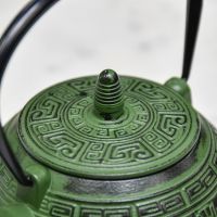 Close-Up of Closed Lid on Ancient Oriental "Ahuic" Green Cast Iron Teapot 