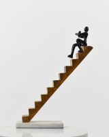 Angled view of cast aluminium, mango wood and marble interior ornament