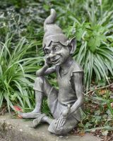 angled view of sitting pixie garden ornament