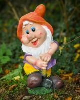 Angled view of colourful garden gnome ornament