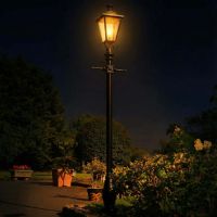 AI Illustration of the 3.25m Antique Brass Dorchester Lamp Post & Lantern Set in Use Illuminated at Night