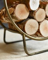 Close-Up of Antique Brass Contemporary Circular Log Rack & Holder With Handle - 45cm in Situ