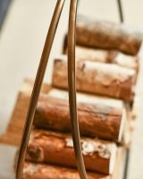 Antique Brass Contemporary Circular Log Rack & Holder With Handle From A High Angle Antique Brass Contemporary Circular Log Rack & Holder With Handle From A High Angle