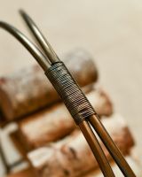 Close Up Of Antique Brass Contemporary Circular Log Rack & Holder With Handle Handle Close Up Of Antique Brass Contemporary Circular Log Rack & Holder With Handle Handle