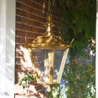Antique Brass Chain Hanging Porch Lantern in Situ at the Front of a House