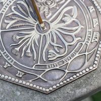 Close-Up of Antique Brass "Flower" Hexagonal Sundial Close-Up of Antique Brass "Flower" Hexagonal Sundial