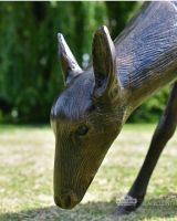 Grazing doe sculpture head shot Grazing doe sculpture head shot