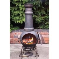 Antique Bronze Cast Iron Chimenea in Situ Antique Bronze Cast Iron Chimenea in Situ