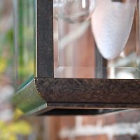 Close-up of the Antique Bronze Finish on the Wall Lantern Close-up of the Antique Bronze Finish on the Wall Lantern