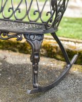 Close-Up of Rocking Design on Cast Aluminium Garden Bench