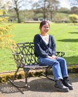Scale Shot of Antique Bronze Hawthorn Heart Rocking Bench 