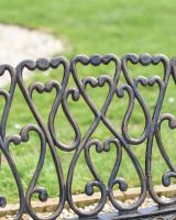 Close-Up pf Love Heart Spiral Design on Rocking Bench