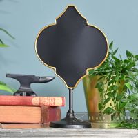 Antique Bronze Vintage Chalk Board Standing by a Blue Wall